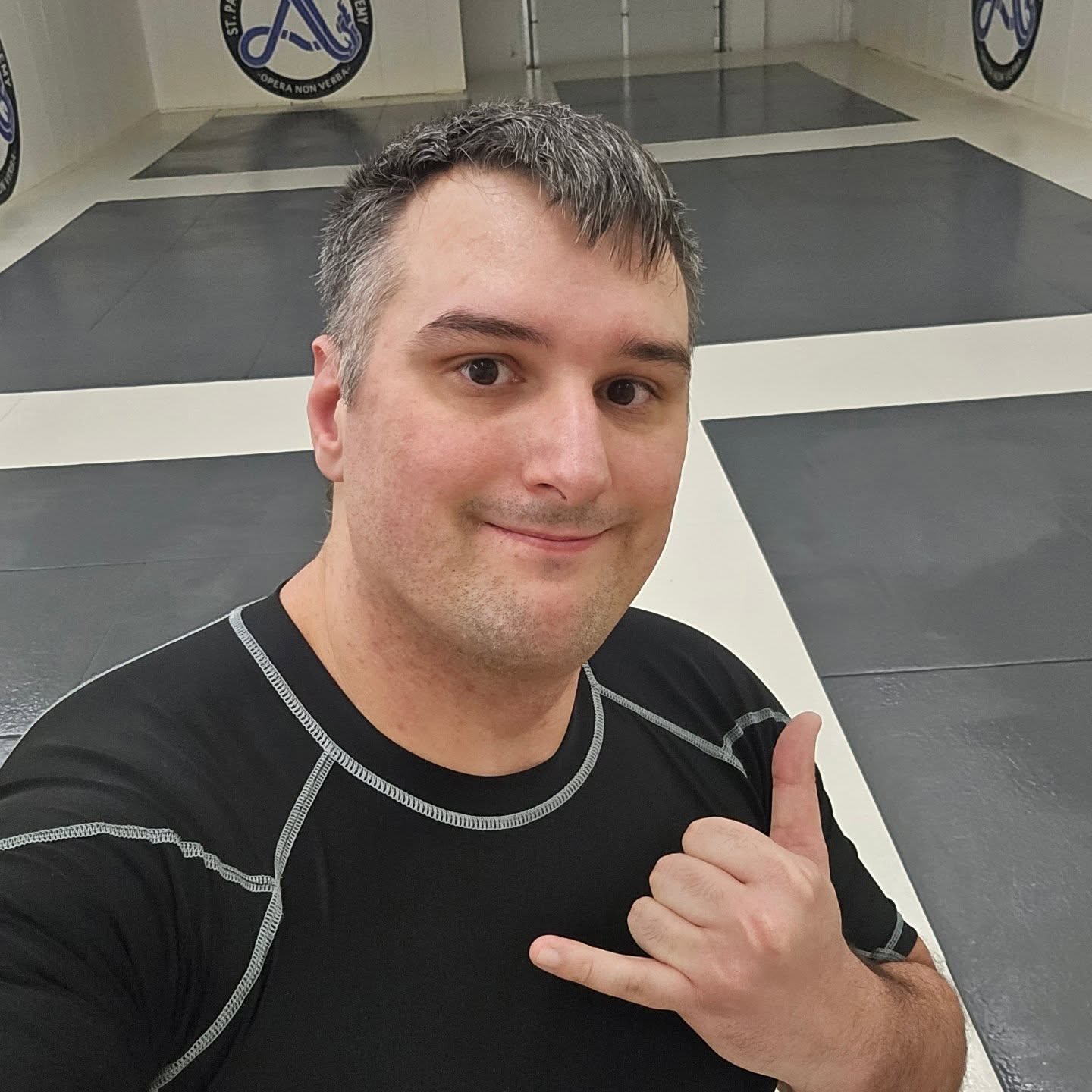 Photo of Scott at his wedding. Posed with a battle-axe.